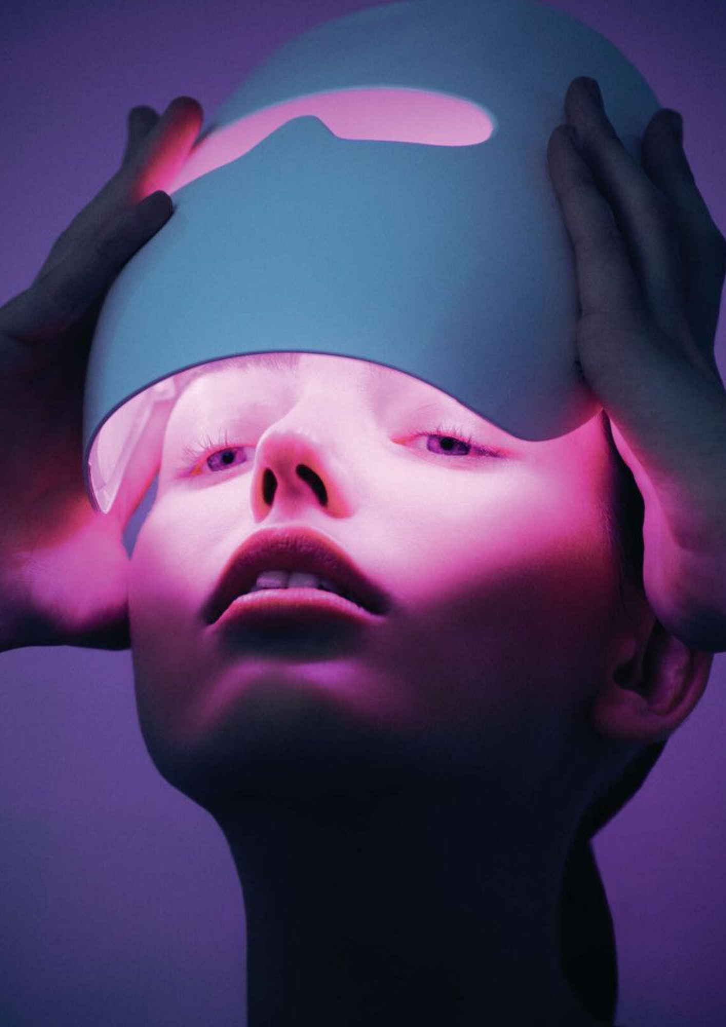 Tasha Ritchson — researcher portrait under pink and violet light